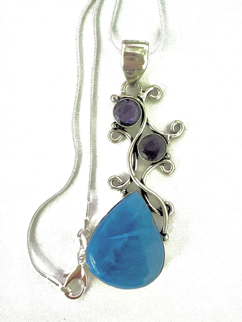 Beautiful, 2 inch, 925 marked, Owyhee and Amethyst pendant on a silver chain.